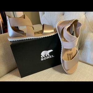 Sorel gladiator style sandals in a champagne color.